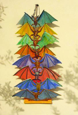 Bat saucepan lid rack in fretsawn wood 